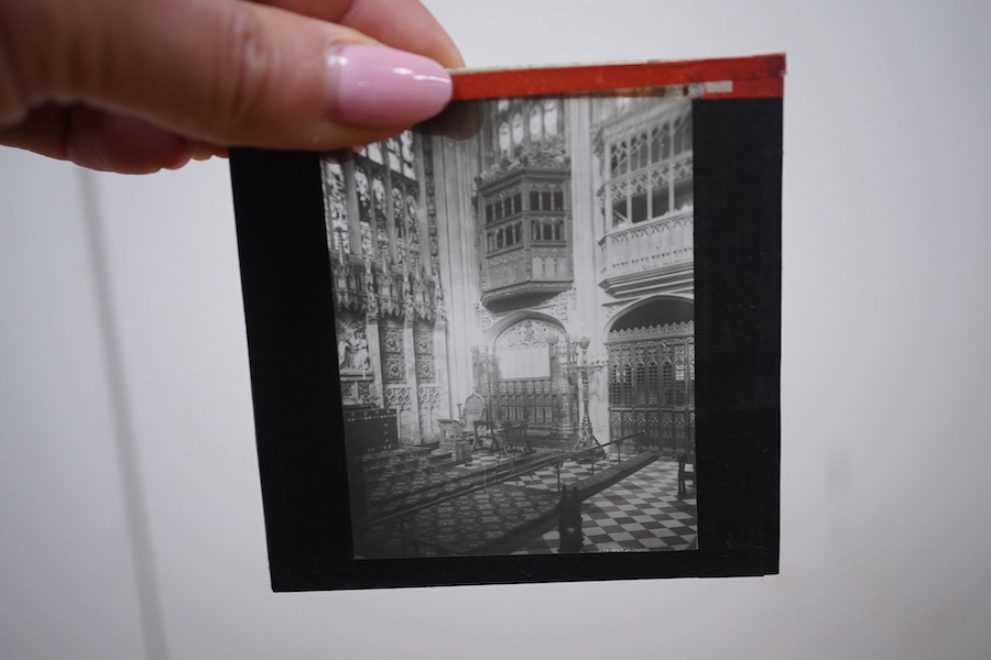 Two boxes of magic lantern slides to include Burnham Abbey and Windsor castle. Condition - fair